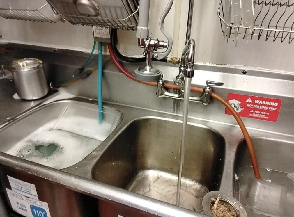 Backed up Commercial Kitchen Sink